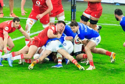150226 - Wales v France - Guinness Six Nations - Antoine Dupont of France passes the ball