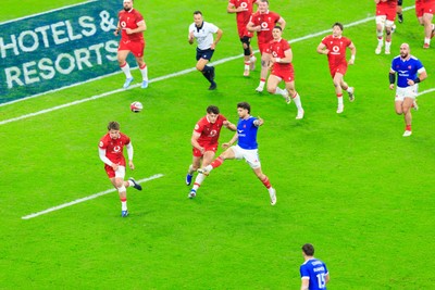 150226 - Wales v France - Guinness Six Nations - Matthieu Jalibert of France cross kicks for France’s second try