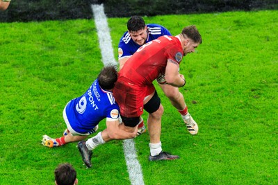150226 - Wales v France - Guinness Six Nations - Olly Cracknell of Wales is tackled by Antoine Dupont of France