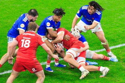 150226 - Wales v France - Guinness Six Nations - Taine Plumtree of Wales drives towards the try line