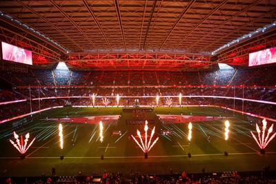 150226 - Wales v France - Guinness Six Nations - Pyrotechnics and light show as teams run onto the field