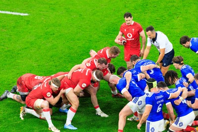 150226 - Wales v France - Guinness Six Nations - A scrum forms with Rhys Carre, Dewi Lake and Tomas Francis of Wales in the front row for Wales