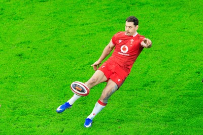 150226 - Wales v France - Guinness Six Nations - Tomos Williams of Wales kicks the ball