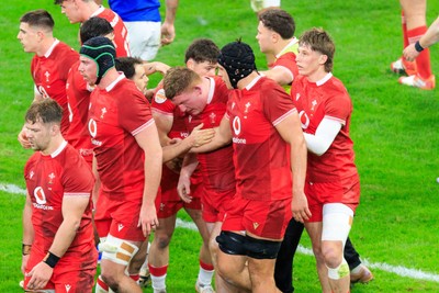 150226 - Wales v France - Guinness Six Nations - Rhys Carre of Wales is congratulated by team mates after scoring a try