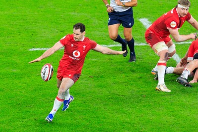 150226 - Wales v France - Guinness Six Nations - Tomos Williams of Wales kicks the ball