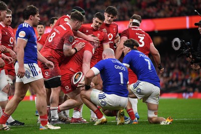 150226 - Wales v France - Guinness Men's Six Nations - Rhys Carre of Wales forces the ball over the line to score a try
