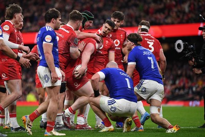 150226 - Wales v France - Guinness Men's Six Nations - Rhys Carre of Wales forces the ball over the line to score a try