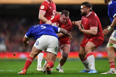 150226 - Wales v France - Guinness Men's Six Nations - Dewi Lake of Wales is challenged by Dorian Aldegheri of France