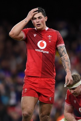 150226 - Wales v France - Guinness Men's Six Nations - Dejected Louis Rees-Zammit of Wales