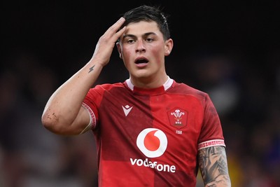 150226 - Wales v France - Guinness Men's Six Nations - Dejected Louis Rees-Zammit of Wales