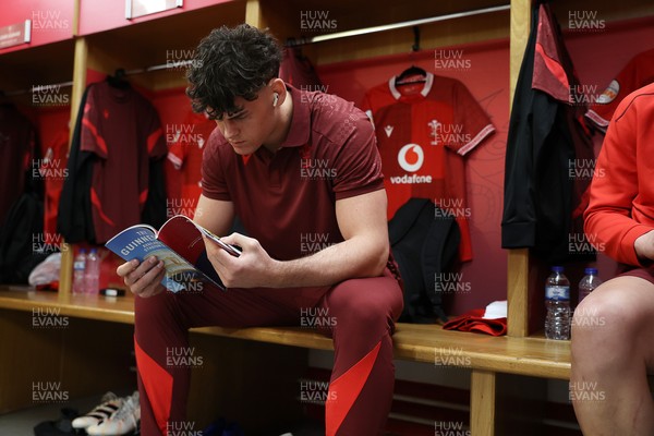 150226 - Wales v France - Guinness Six Nations Championship - Eddie James of Wales in the dressing room before the game