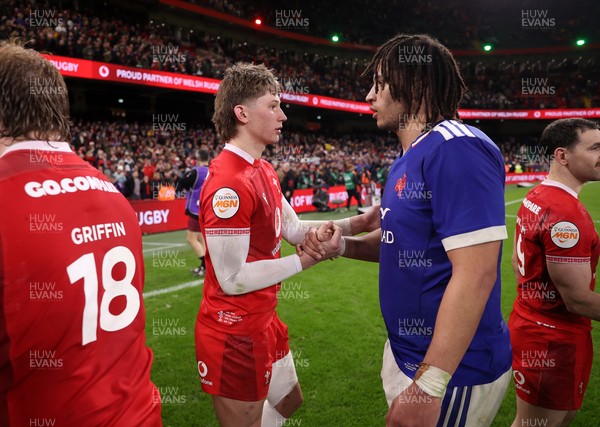 150226 - Wales v France - Guinness Six Nations Championship - Ellis Mee of Wales shakes hands with the opposition at full time