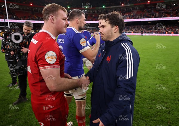 150226 - Wales v France - Guinness Six Nations Championship - Dewi Lake of Wales and Antoine Dupont of France at full time