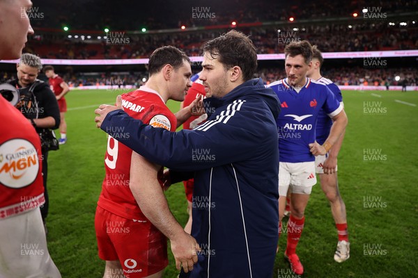 150226 - Wales v France - Guinness Six Nations Championship - Tomos Williams of Wales and Antoine Dupont of France at full time