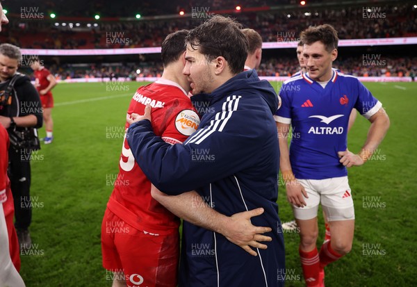150226 - Wales v France - Guinness Six Nations Championship - Tomos Williams of Wales and Antoine Dupont of France at full time