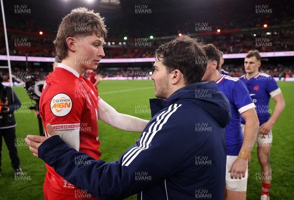 150226 - Wales v France - Guinness Six Nations Championship - Ellis Mee of Wales and Antoine Dupont of France at full time