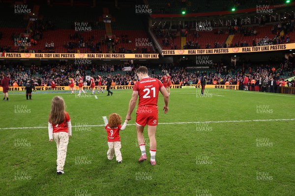 150226 - Wales v France - Guinness Six Nations Championship - Kieran Hardy of Wales with his family at full time