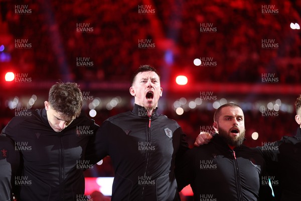 150226 - Wales v France - Guinness Six Nations Championship - Adam Beard of Wales sings the anthem