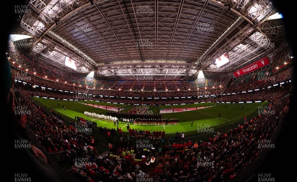 150226 - Wales v France, 2026 Guinness Six Nations - The Principality Stadium is lit up as the teams run out