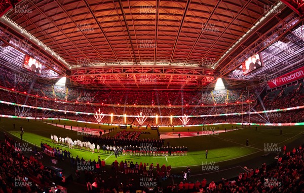 150226 - Wales v France, 2026 Guinness Six Nations - The Principality Stadium is lit up as the teams run out