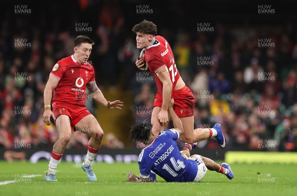150226 - Wales v France, 2026 Guinness Six Nations - Eddie James of Wales takes on Theo Attissogbe of France
