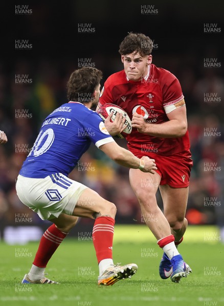 150226 - Wales v France, 2026 Guinness Six Nations - Eddie James of Wales takes on Matthieu Jalibert of France