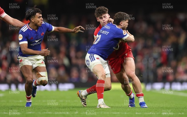 150226 - Wales v France, 2026 Guinness Six Nations - Eddie James of Wales takes on Matthieu Jalibert of France