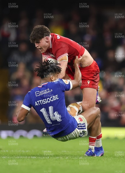 150226 - Wales v France, 2026 Guinness Six Nations - Eddie James of Wales takes on Theo Attissogbe of France