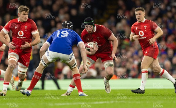 150226 - Wales v France, 2026 Guinness Six Nations - Adam Beard of Wales takes on Thibaud Flament of France 