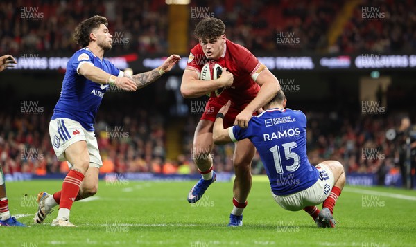 150226 - Wales v France, 2026 Guinness Six Nations - Eddie James of Wales takes on Thomas Ramos of France 