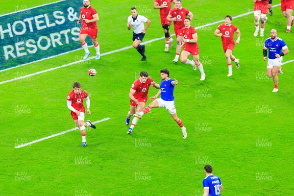150226 - Wales v France - Guinness Six Nations - Matthieu Jalibert of France cross kicks for France’s second try