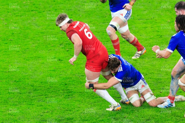 150226 - Wales v France - Guinness Six Nations - Aaron Wainwright of Wales is tackled