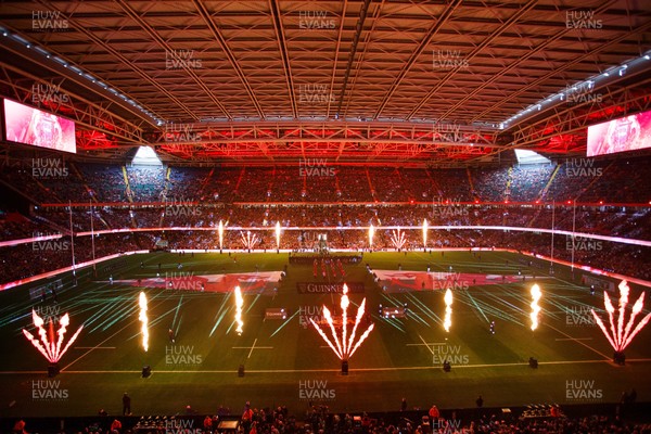 150226 - Wales v France - Guinness Six Nations - Pyrotechnics and light show as teams run onto the field