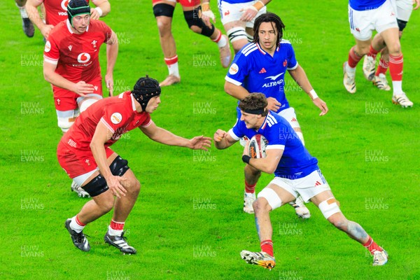 150226 - Wales v France - Guinness Six Nations - Oscar Jegou of France takes on Dafydd Jenkins of Wales
