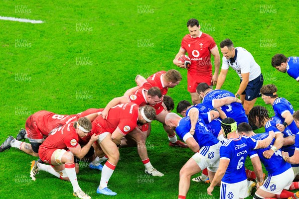 150226 - Wales v France - Guinness Six Nations - A scrum forms with Rhys Carre, Dewi Lake and Tomas Francis of Wales in the front row for Wales
