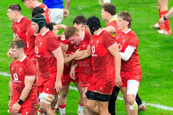 150226 - Wales v France - Guinness Six Nations - Rhys Carre of Wales is congratulated by team mates after scoring a try
