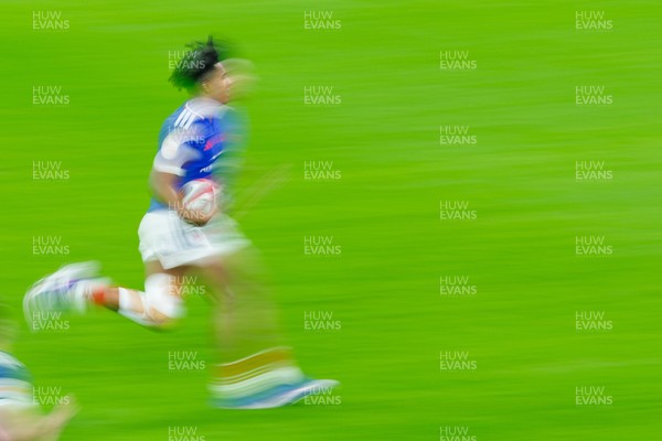 150226 - Wales v France - Guinness Six Nations - Theo Attissogbe of France on the way to scoring a try