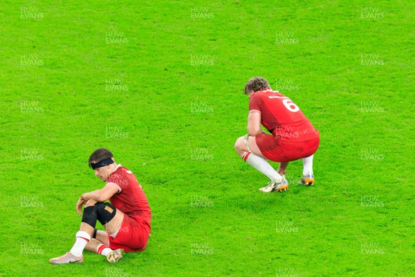 150226 - Wales v France - Guinness Six Nations - Alex Mann and Aaron Wainwright of Wales look dejected at the end of the match