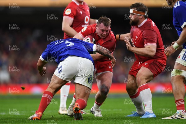 150226 - Wales v France - Guinness Men's Six Nations - Dewi Lake of Wales is challenged by Dorian Aldegheri of France
