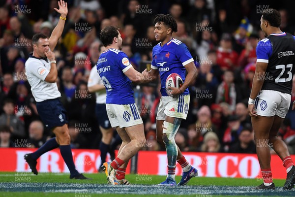 150226 - Wales v France - Guinness Men's Six Nations - Theo Attissogbe of France celebrates scoring a try with team mates