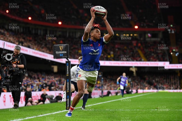 150226 - Wales v France - Guinness Men's Six Nations - Theo Attissogbe of France catches the ball before running in to score a try
