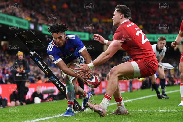 150226 - Wales v France - Guinness Men's Six Nations - Theo Attissogbe of France is stopped just before the line by Mason Grady of Wales