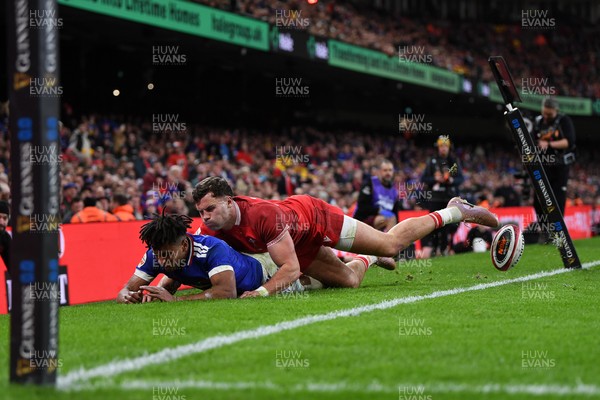 150226 - Wales v France - Guinness Men's Six Nations - Theo Attissogbe of France is stopped just before the line by Mason Grady of Wales