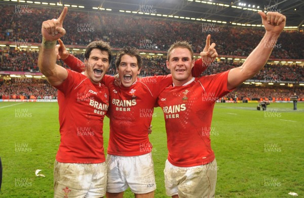 15.03.08 - Wales v France - RBS Six Nations 2008 - Wales' Mike Phillips, James Hook and Lee Byrne celebrate winning the grand slam after beating France 