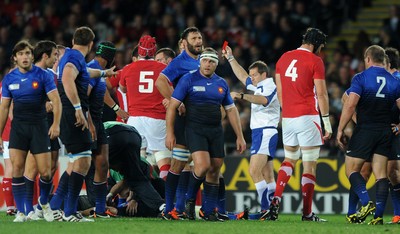 15.10.11 - Wales v France - Rugby World Cup Semi-Final 2011 - Sam Warburton (hidden) of Wales is shown a red card by referee Alain Rolland. 