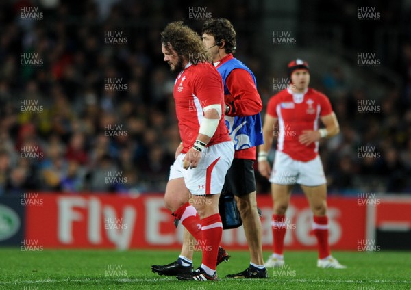 15.10.11 - Wales v France - Rugby World Cup Semi-Final 2011 - Adam Jones of Wales leaves the field with Physio Mark Davies. 