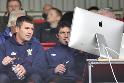 160612 - Wales v France  - Race Course Ground,  Wrexham - Wales coach Iestyn Harris, left, watches the action from the stands