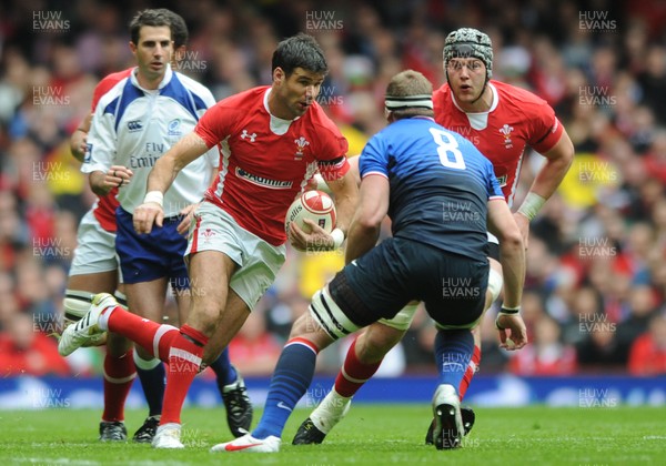 170312 - Wales v France - RBS Six Nations 2012 -Mike Phillips of Wales takes on Imanol Harinordoquy of France