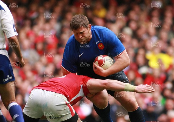 170312 Wales v France - RBS 6 Nations Championship - France's Vincent Debaty is tackled by Wales' Ryan Jones