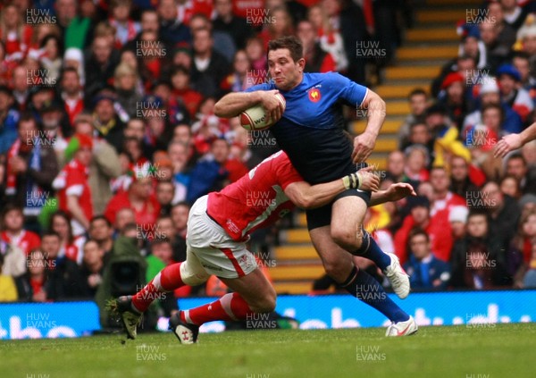 170312 Wales v France - RBS 6 Nations Championship - France's Florian Fritz is tackled by Wales' Jamie Roberts